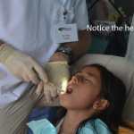 Dr. Falvey working with a patient during a Honduras Mission trip