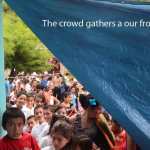 A crowd gathering in front of the dental clinic